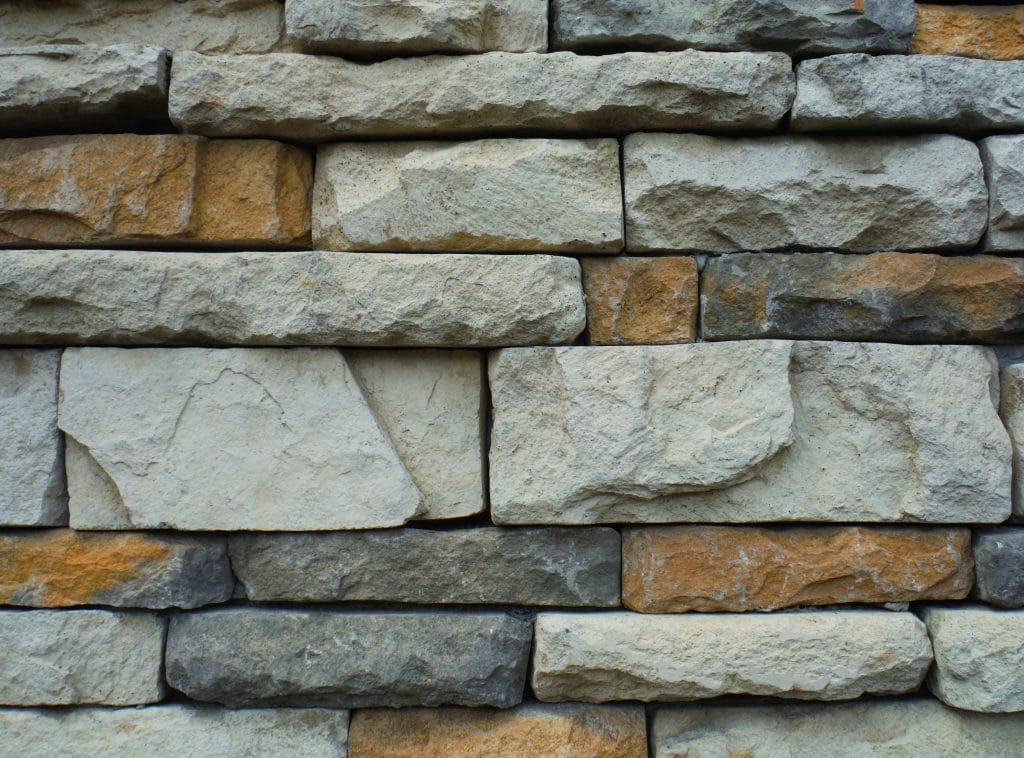 A very close view of a retaining block wall